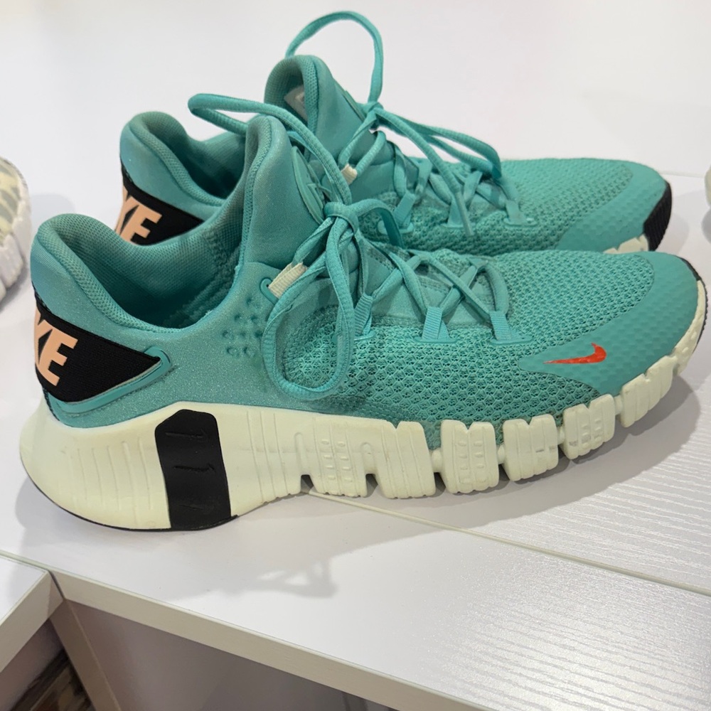 Nike Turquoise Sneakers with Orange Accent